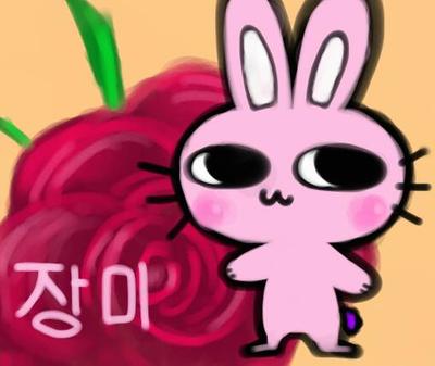 A small pink rabbit character with wide open eyes. She is saying '장미'.